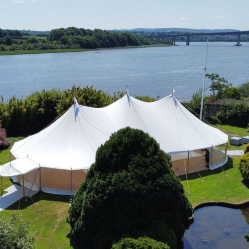 aerial view of the marquee at brook hall overlooking the river foyle